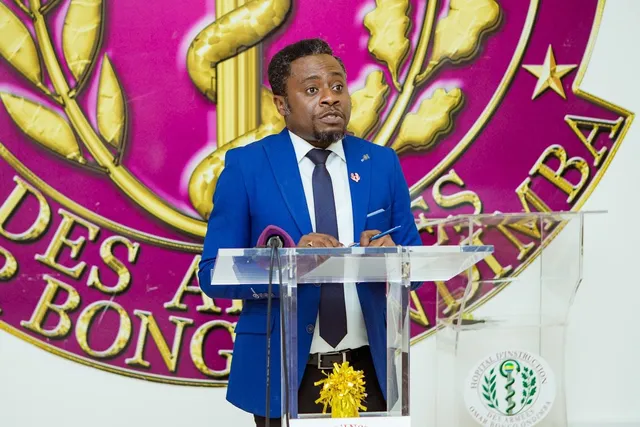 A speaker addresses the audience from the lectern during the scientific meeting