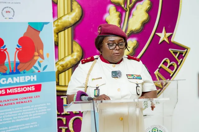 A health service officer speaks from the lectern